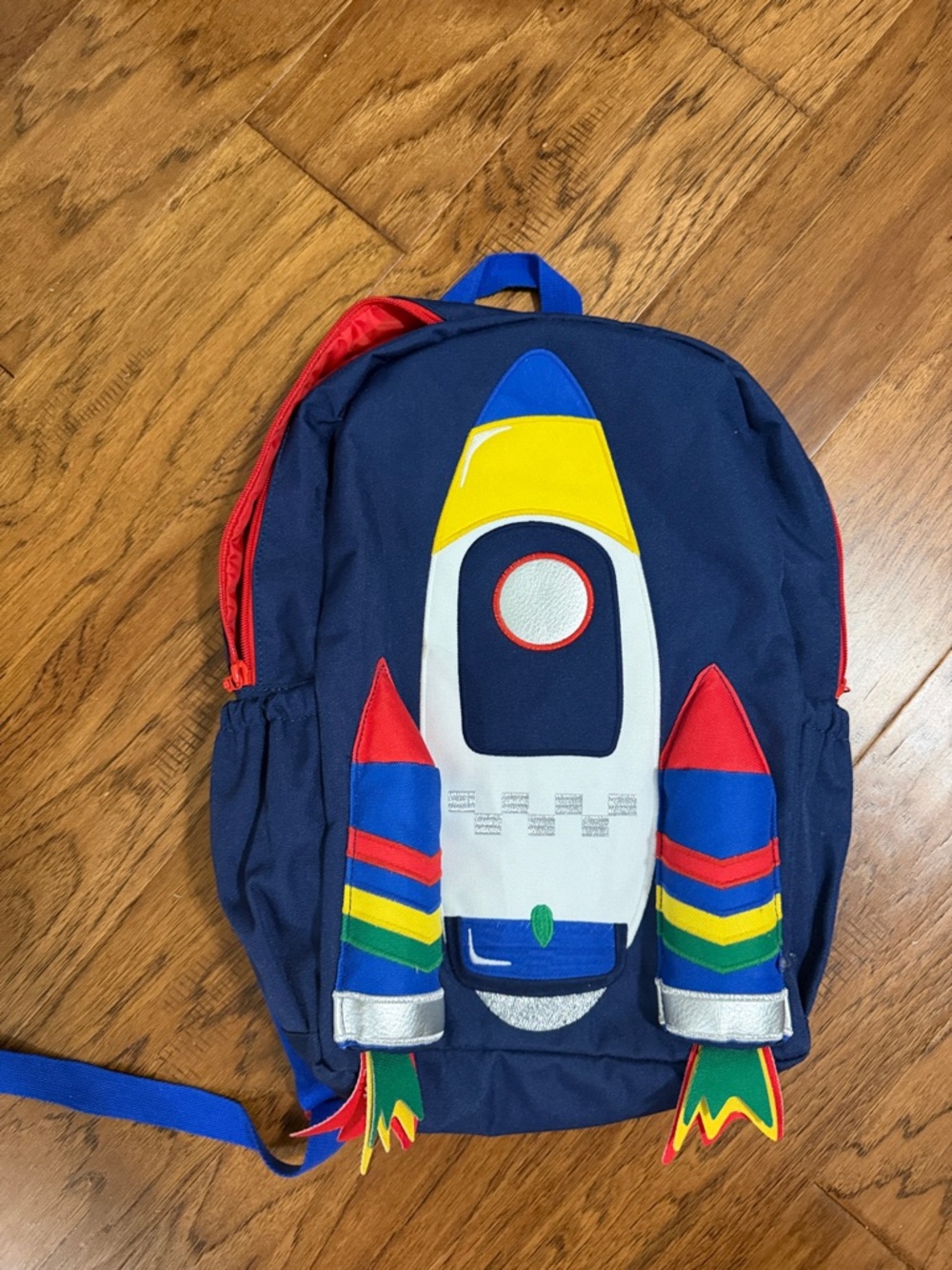 EUC Boden Navy Backpack with Bright Red Interior